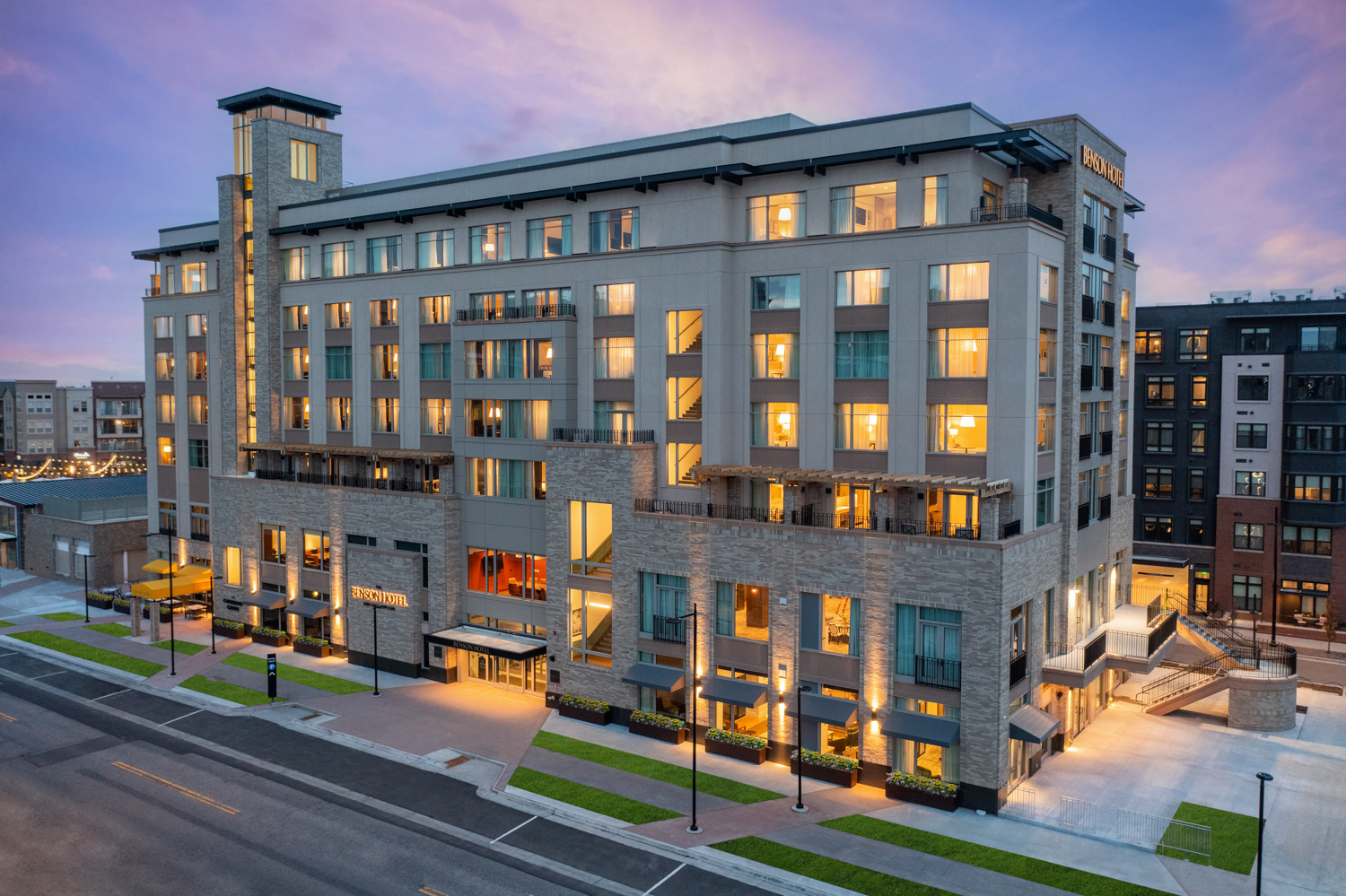 The Benson Hotel exterior at dusk