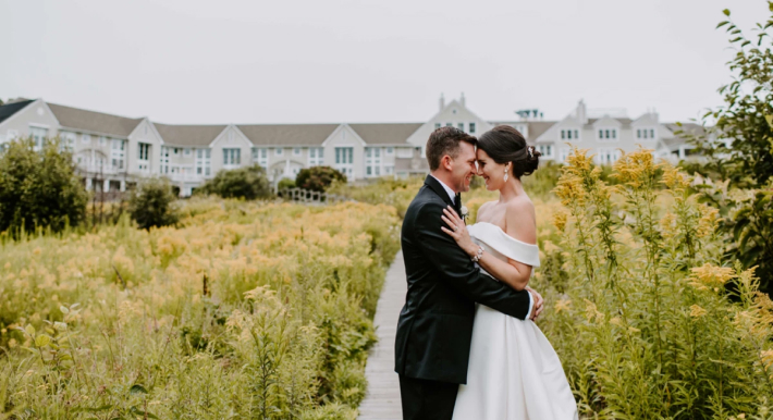 Wedding Photo On The Boardwalk In Front Of Inn By The Sea